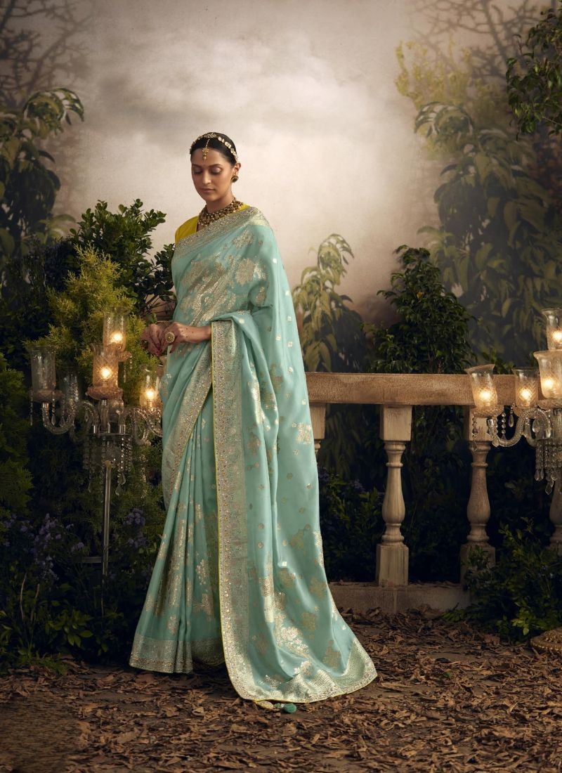 Exquisite sequin worked dola silk saree in sky blue