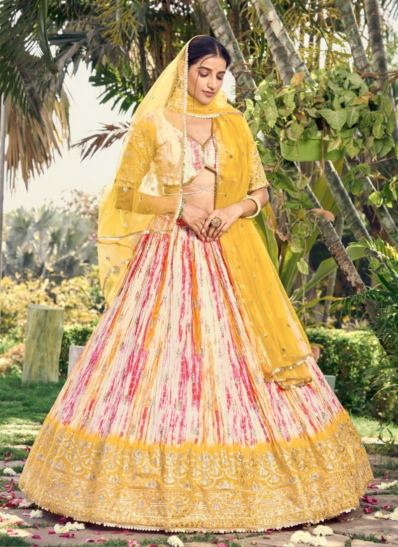 Beautifully digital printed and embroidered Chinon lehenga choli in yellow