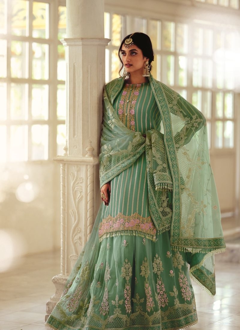 Designer patch embroidered georgette sharara suit in green