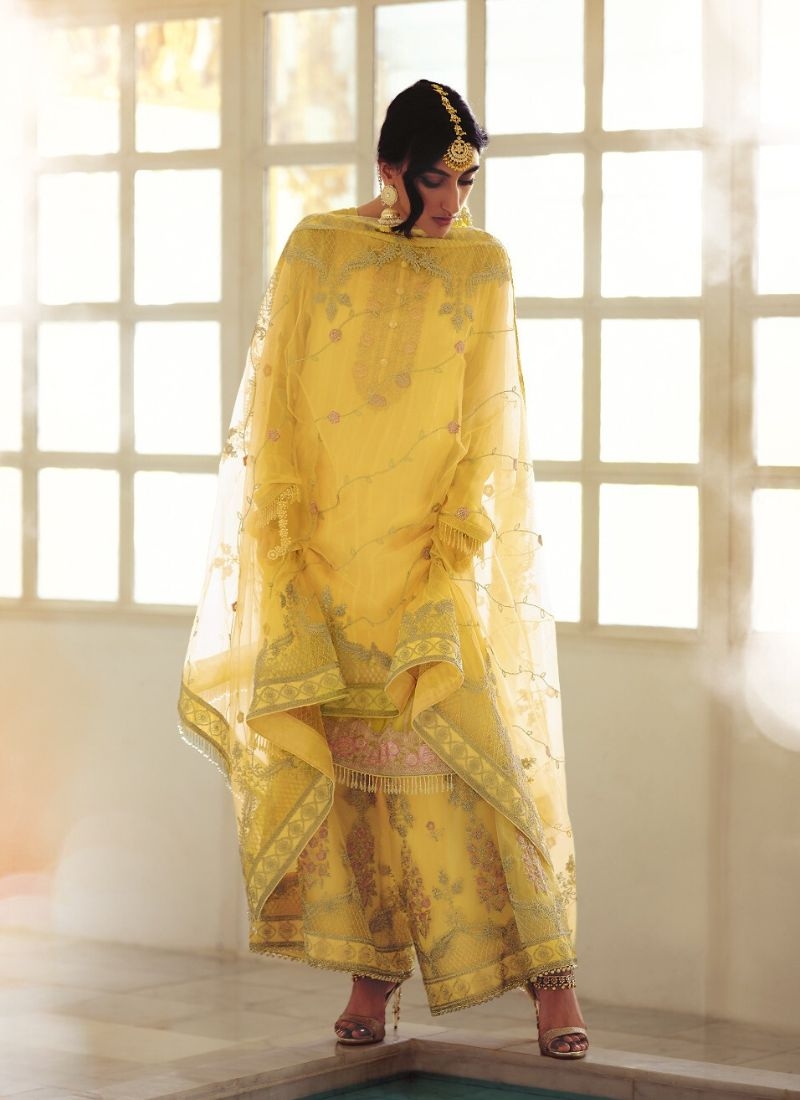 Designer patch embroidered georgette sharara suit in yellow