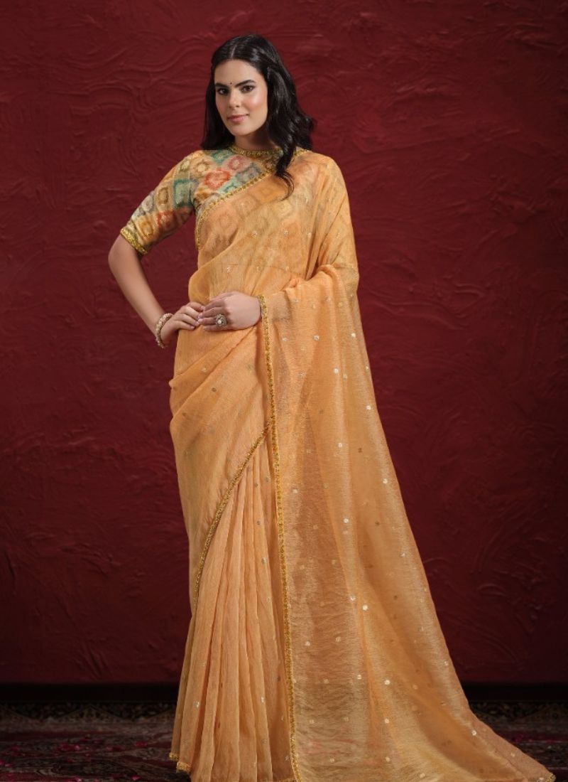 Stunning embroidered silk saree in orange