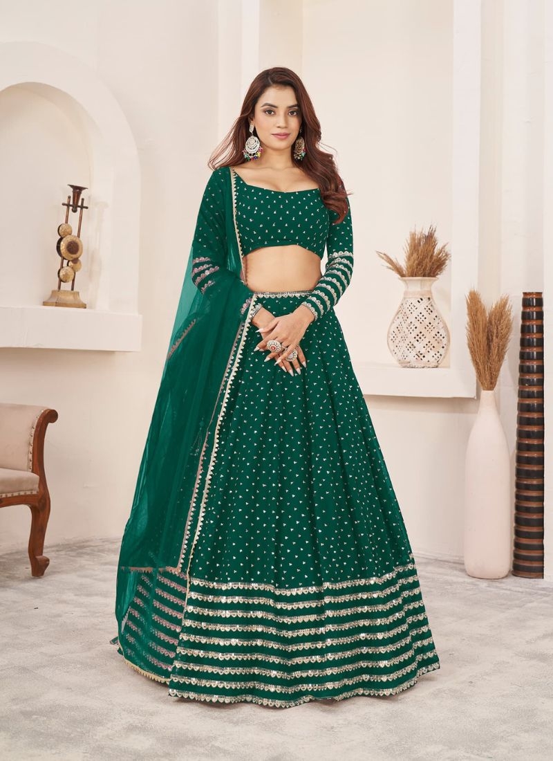 Exquisite embroidered georgette lehenga choli dark green