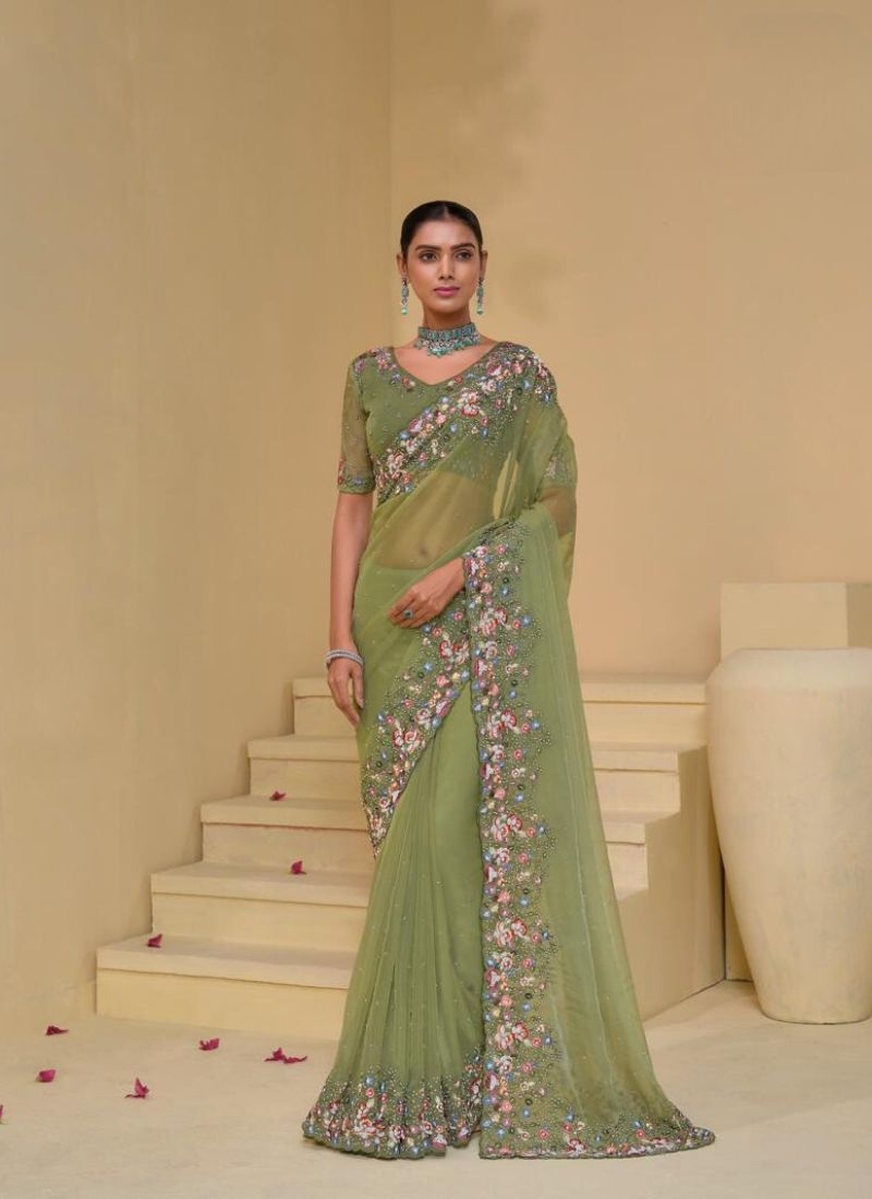 Stunning Heavy embroidered pure silk saree in light green