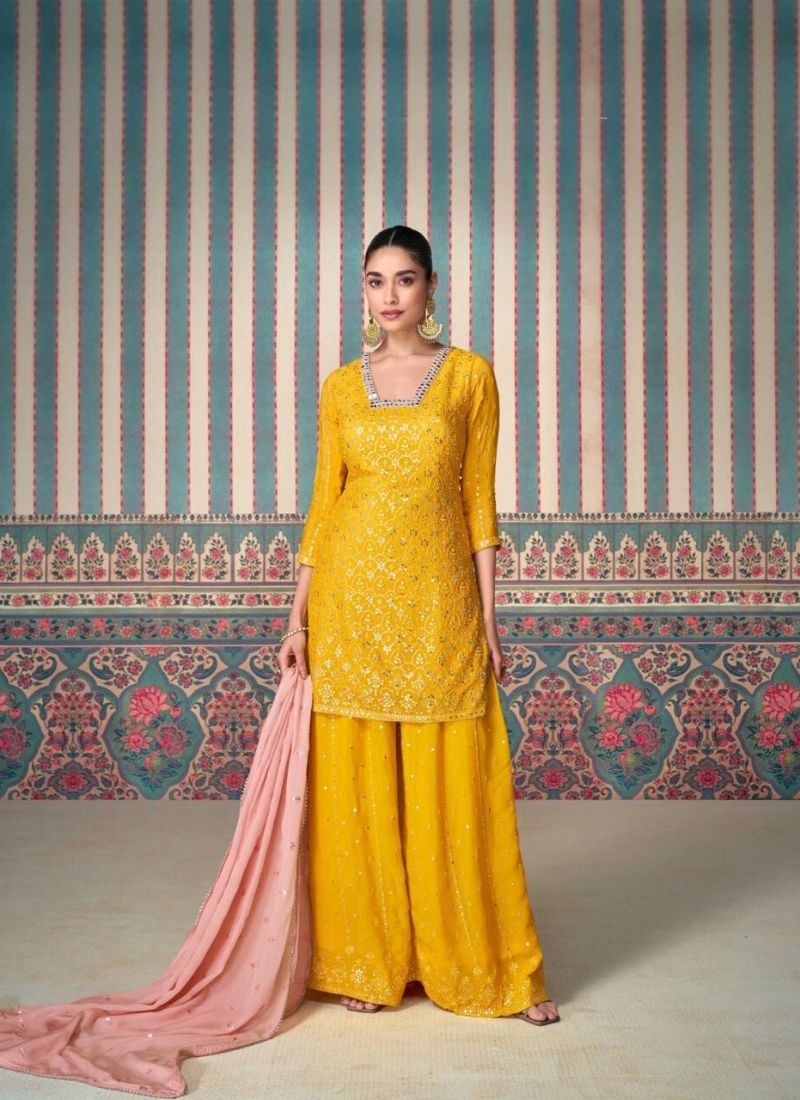 Designer heavy embroidered chinon silk sharara suit in yellow