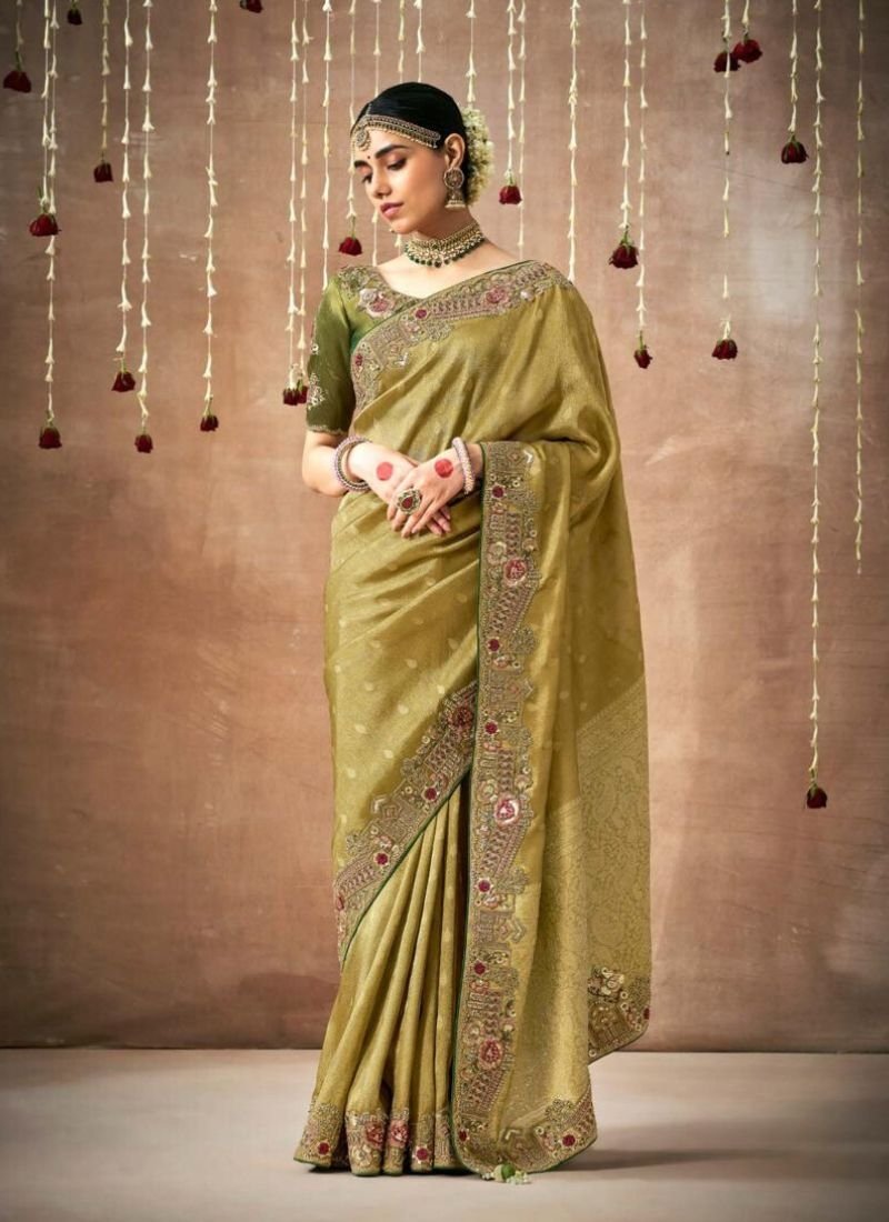 Exquisite thread embroidered Dola silk saree in mehandi green