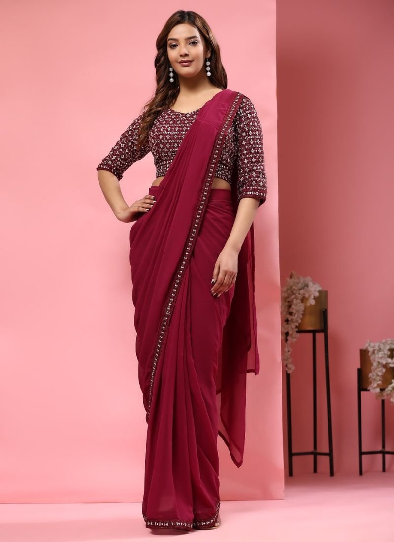 Beautiful embroidered pure georgette saree in red