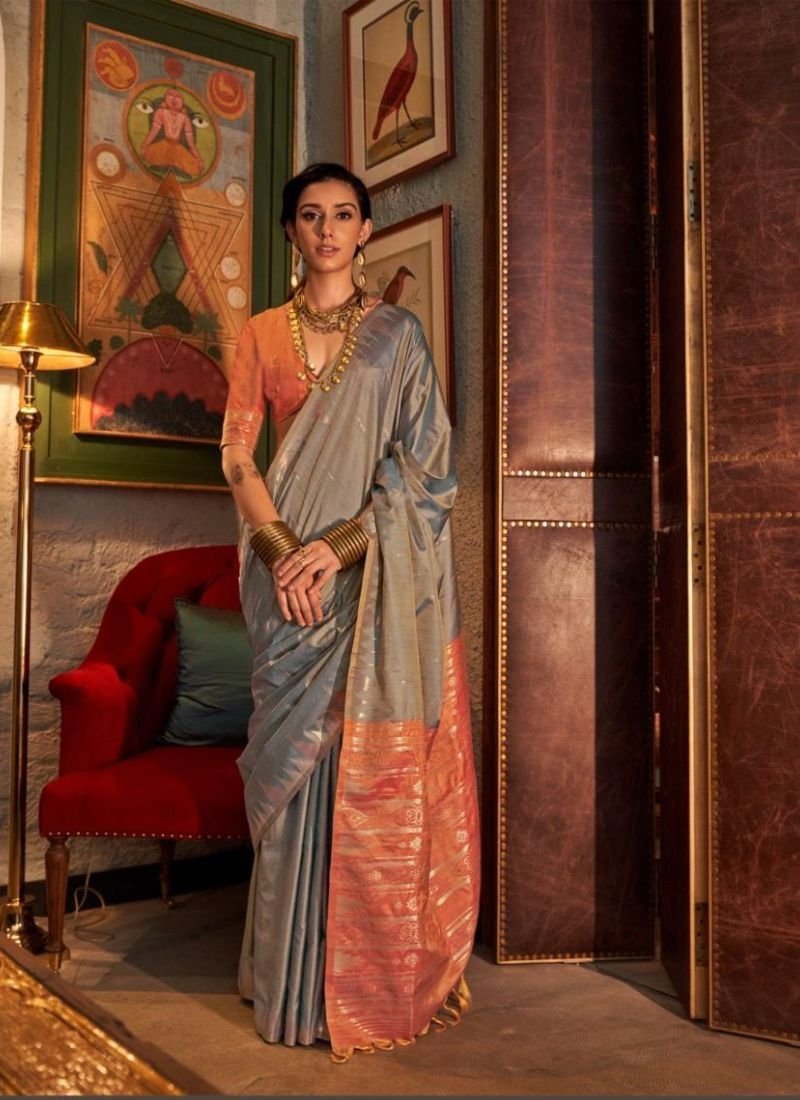 Exquisite designer hand weaved silk saree in grey