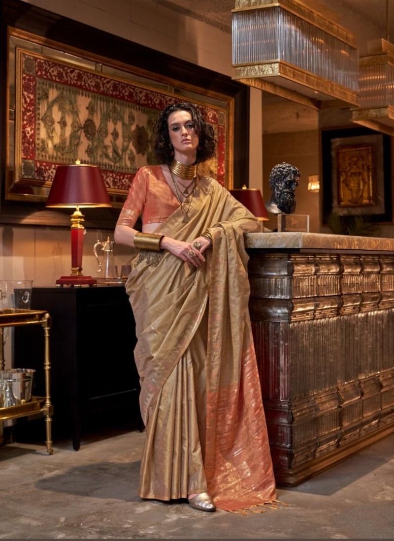 Exquisite designer hand weaved silk saree in golden