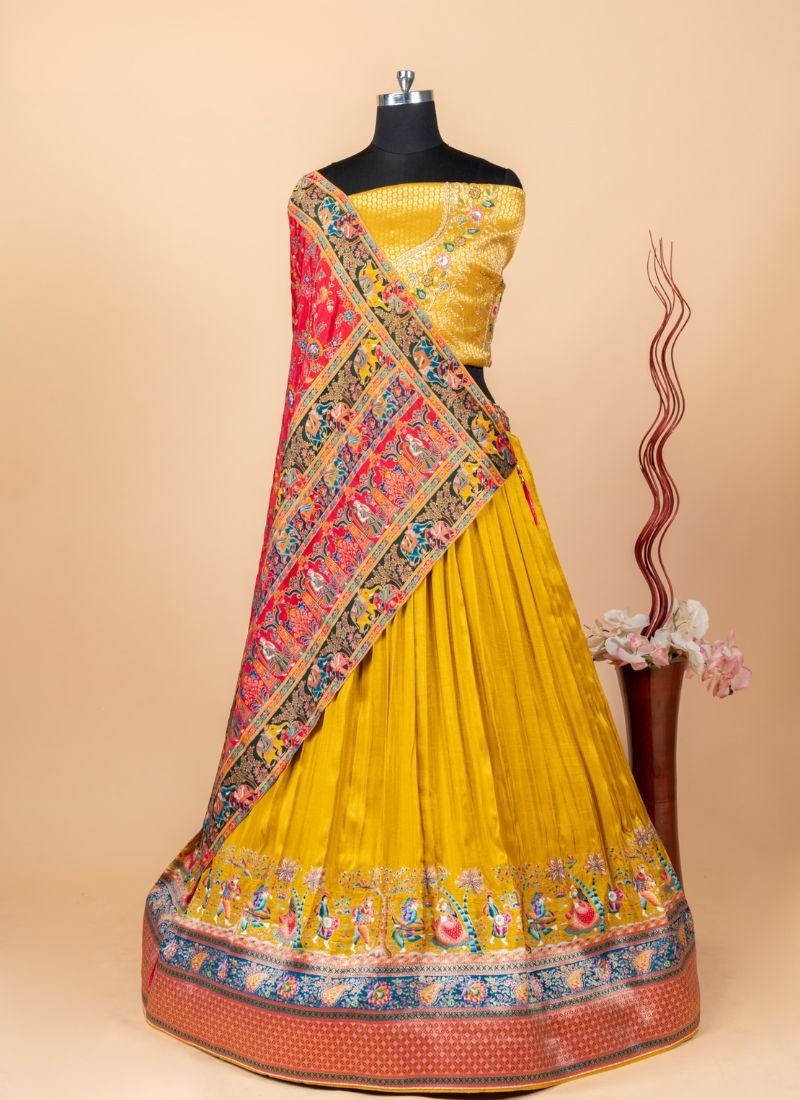 Designer heavy embroidered viscose silk lehenga in yellow