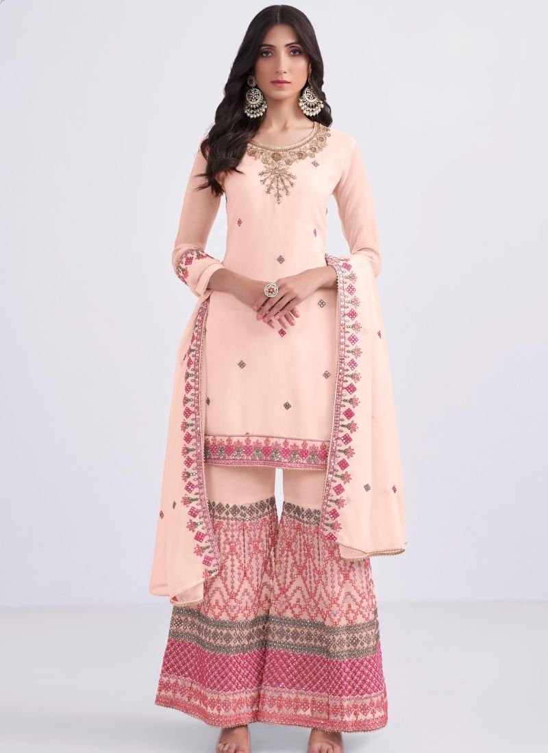 Heavy embroidered georgette sharara suit in baby pink