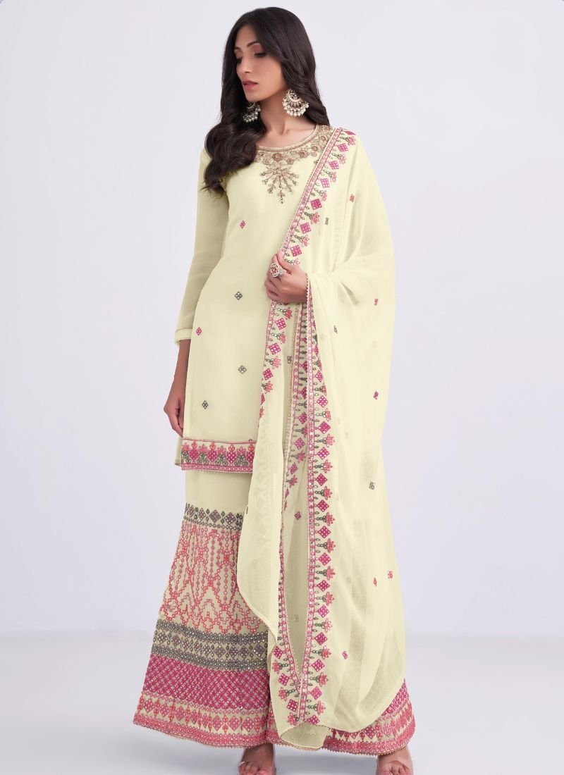 Heavy embroidered georgette sharara suit in cream