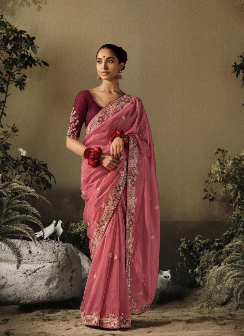 Designer hand-embroidered silk saree in peach