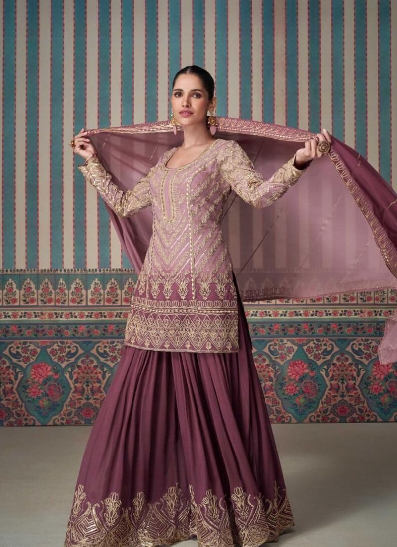 Stunning embroidered georgette sharara suit in purple