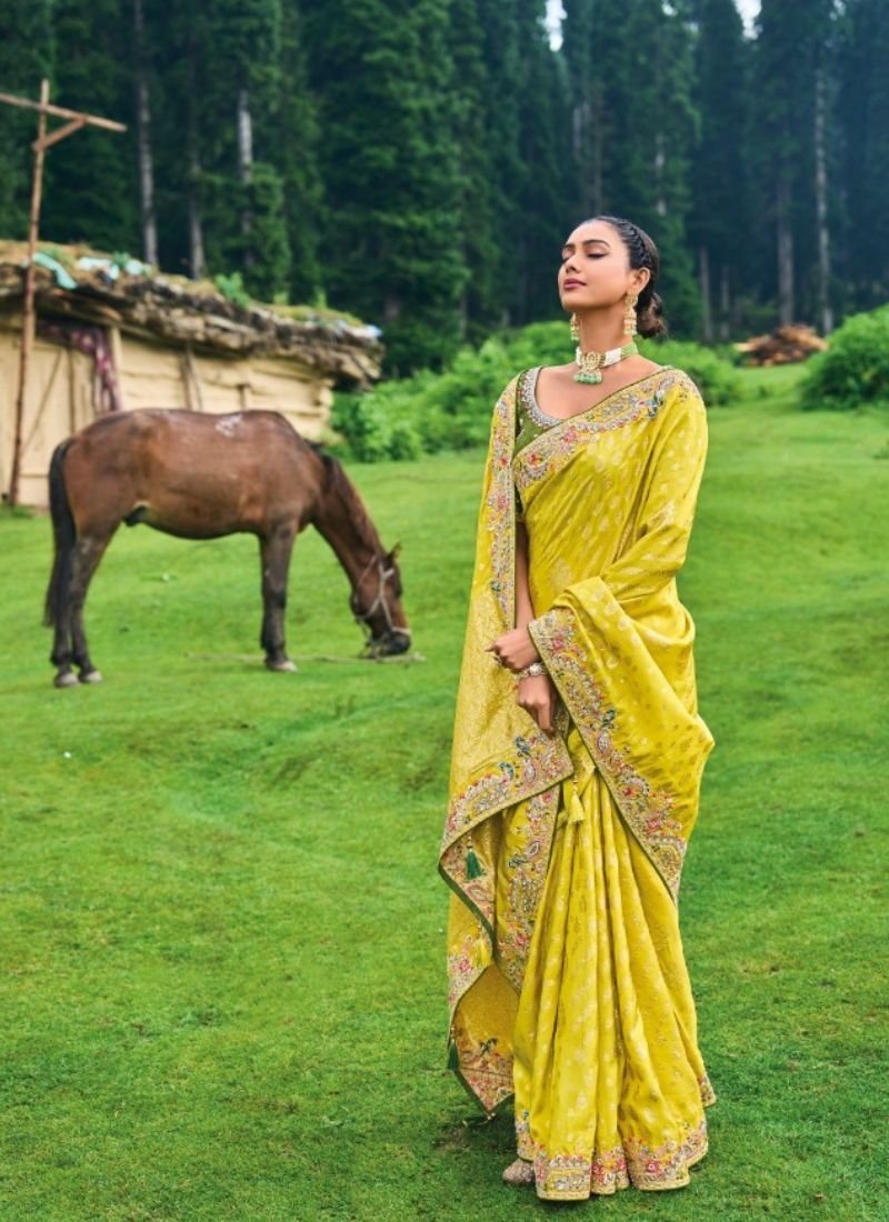 Beautiful hand embroidered organza silk saree in yellow