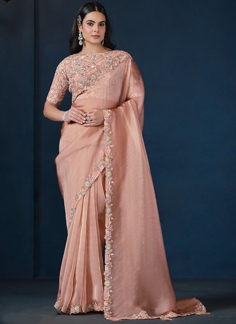 Exquisite hand embroidered silk saree in peach