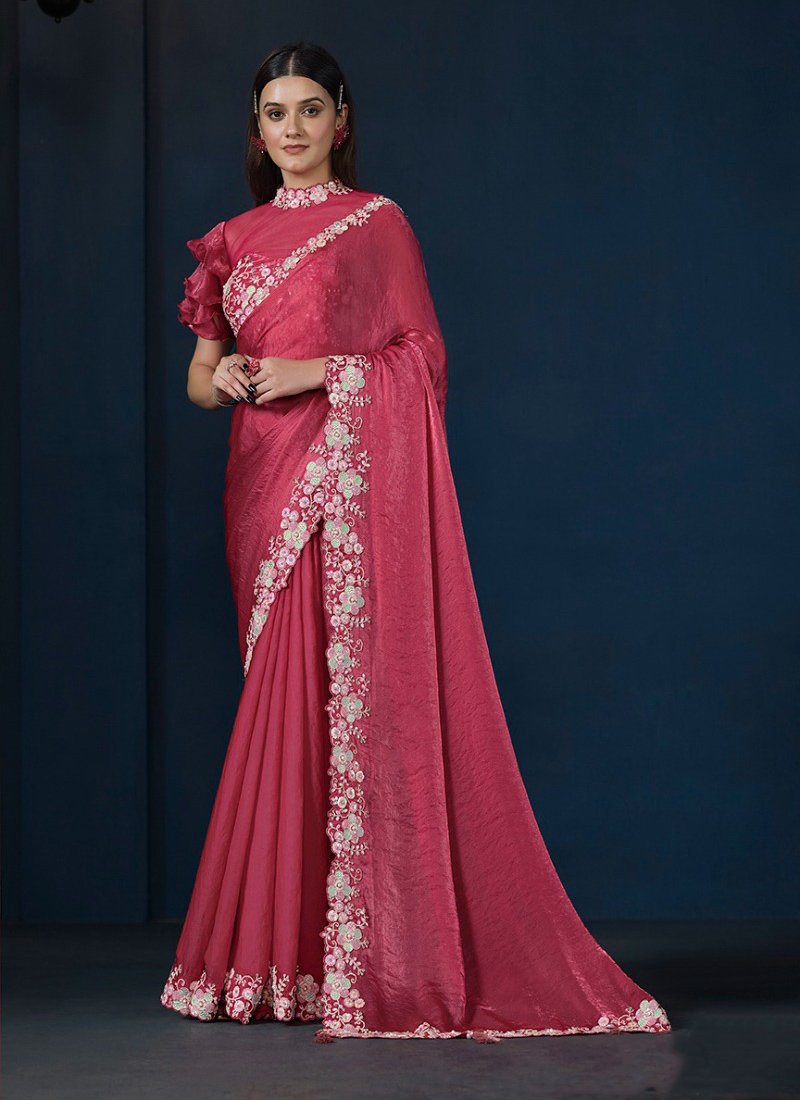 Exquisite hand embroidered silk saree in red