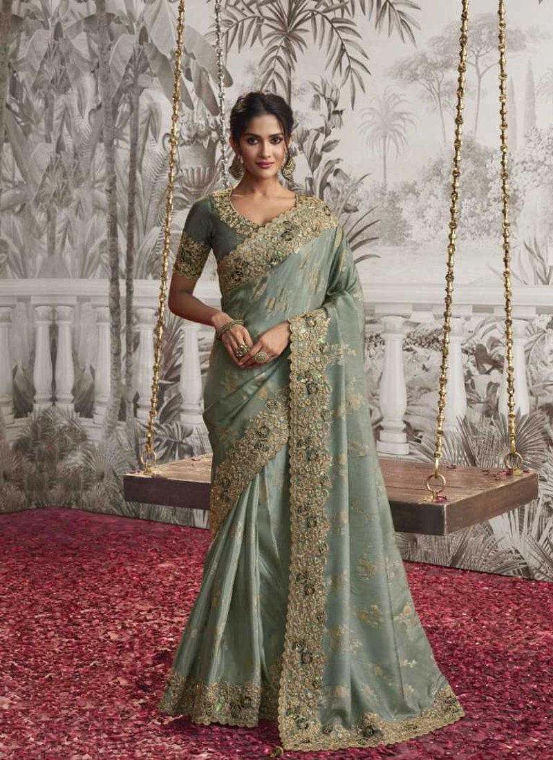 Beautiful thread embroidered georgette saree in green