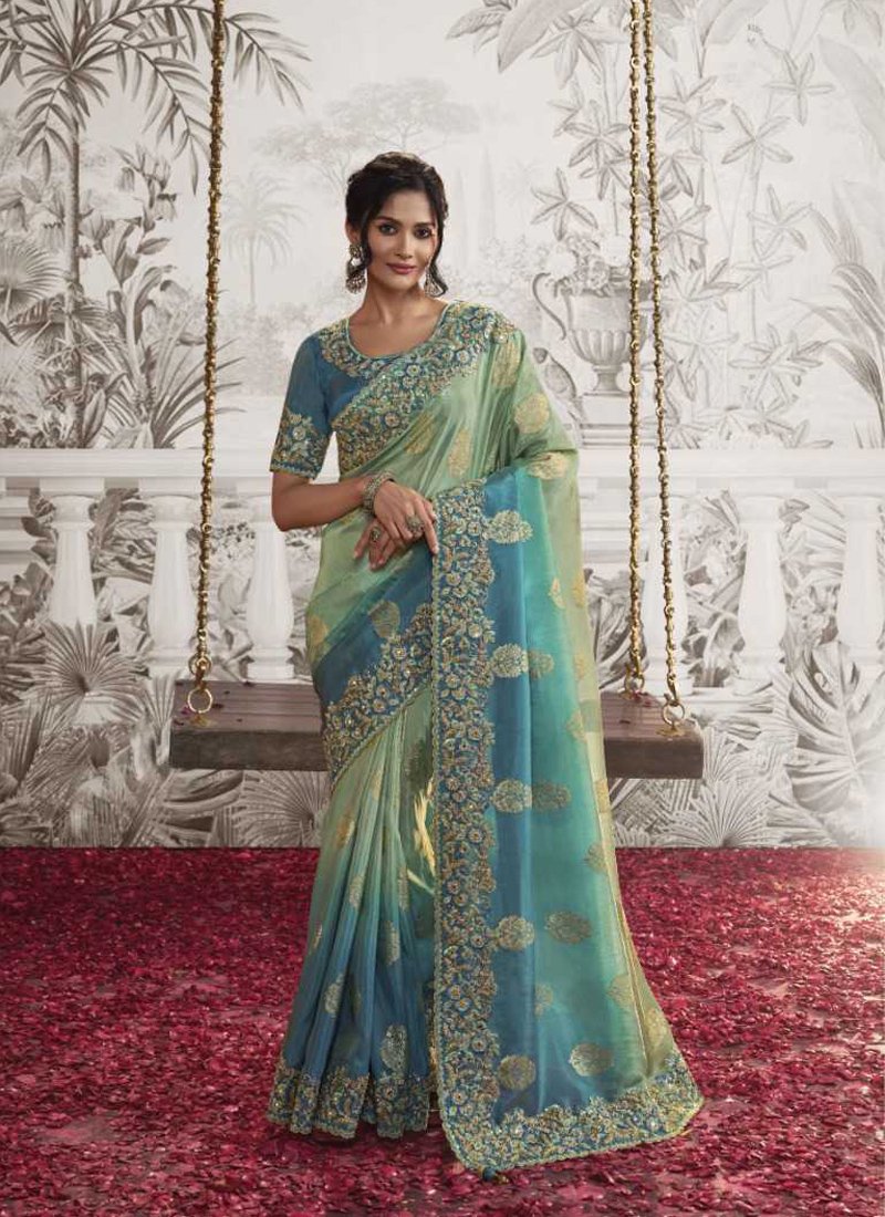 Beautiful embroidered georgette saree in light green