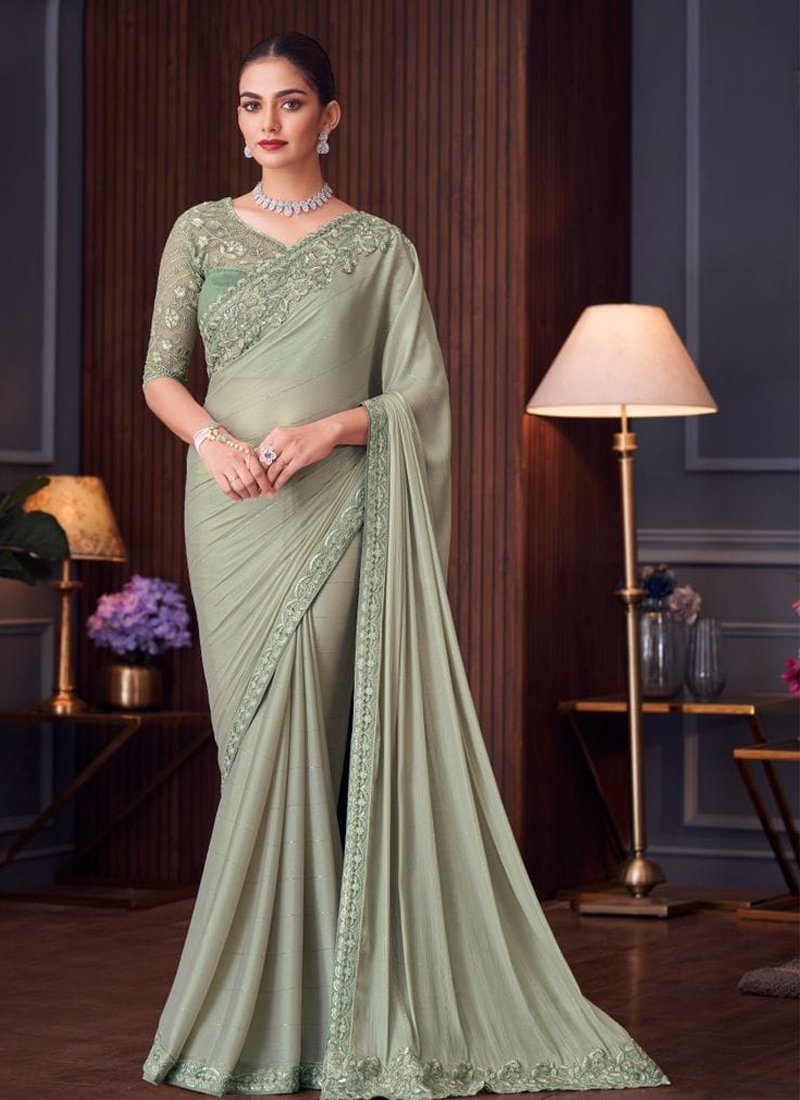 Beautiful heavy floral embroidered satin silk saree in light green