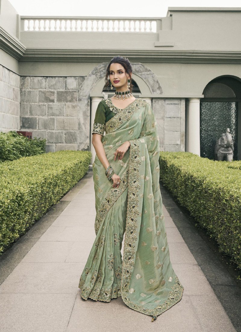 Stylish zari woven tissue silk saree in green