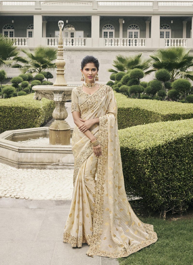 Stylish zari woven tissue silk saree in cream