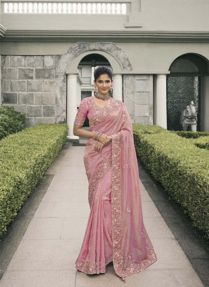 Stylish zari woven tissue silk saree in nude pink