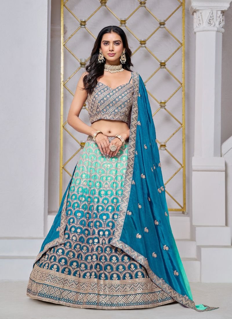 Exquisite heavy embroidered chinon lehenga in blue