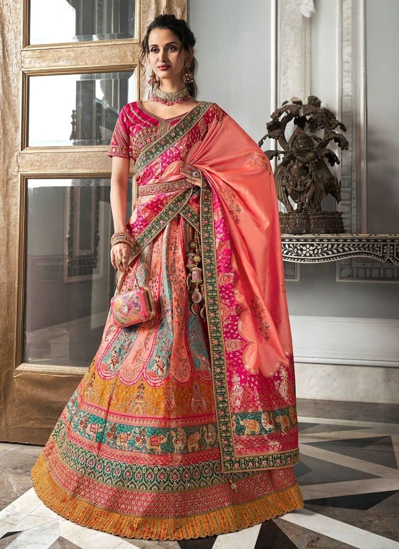 Designer zarkan embroidered banarsi silk lehenga in peach