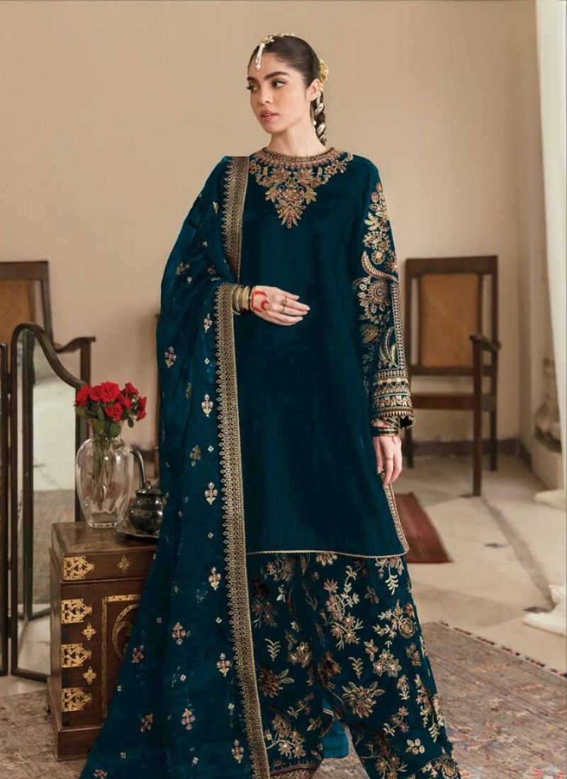 Exquisite heavy embroidered velvet salwar suit in dark blue