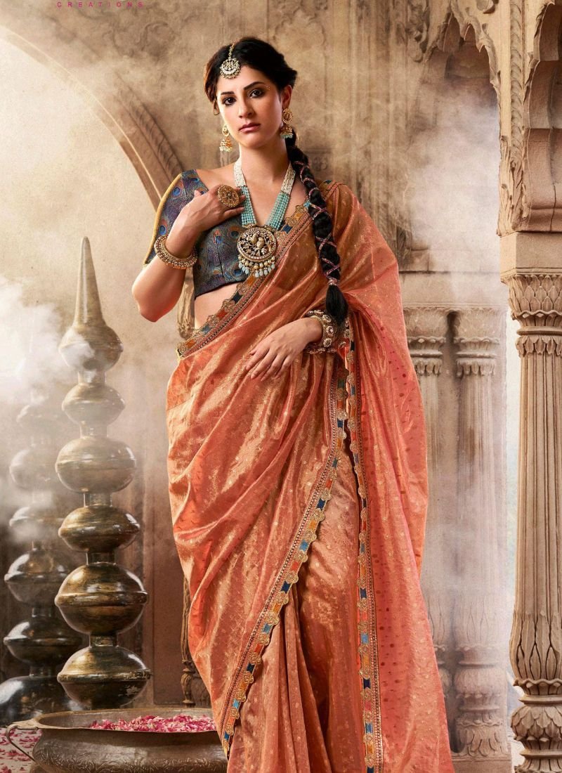 Elegant hand woven tissue silk saree in orange