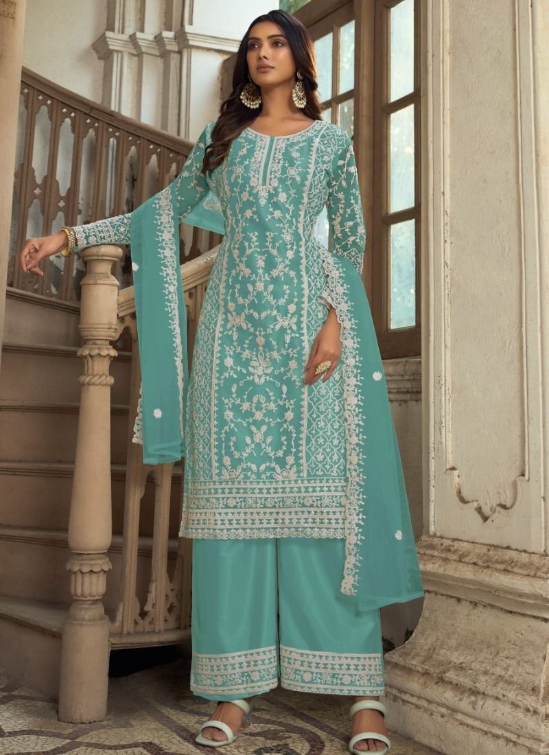 Beautiful heavy embroidered butterfly net kurta palazzo suit in light green