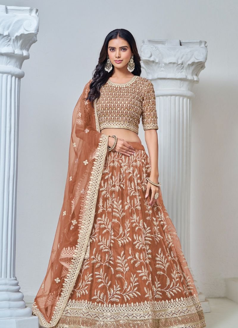 Exquisite heavy thread embroidered net lehenga choli in orange