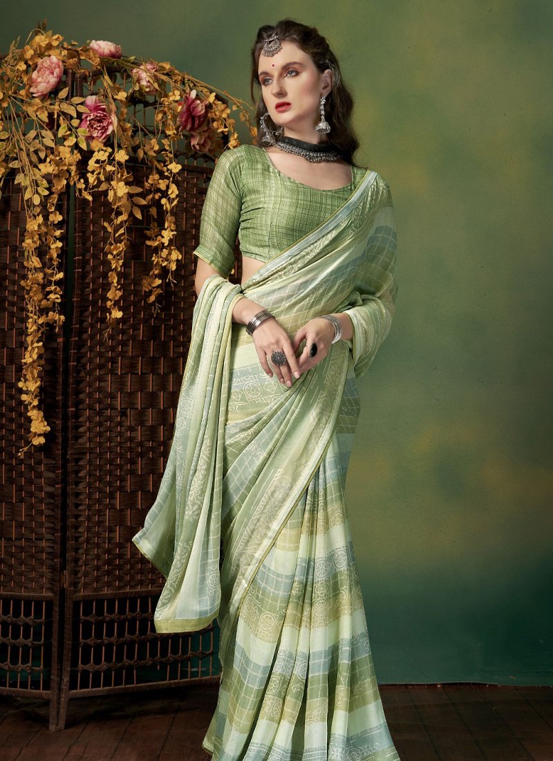 Elegant pattern worked georgette saree in green