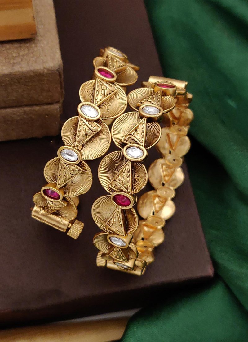 Latest gold plated brass bangles set in pink