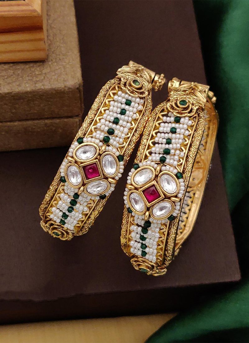 Latest gold plated brass bangles set in pearl white