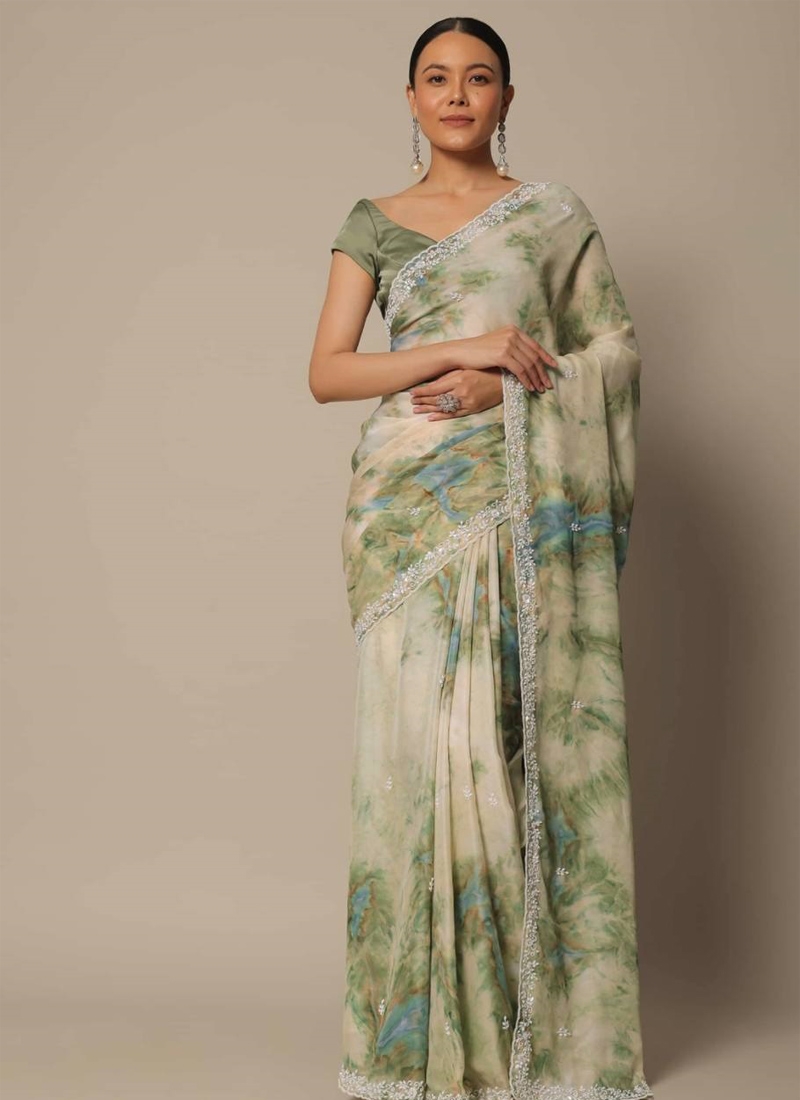 Georgette digital printed saree with fancy cut border in green