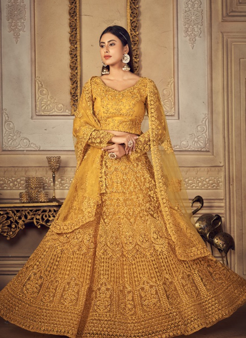 Thread embroidery cording with stone work lehenga choli in yellow