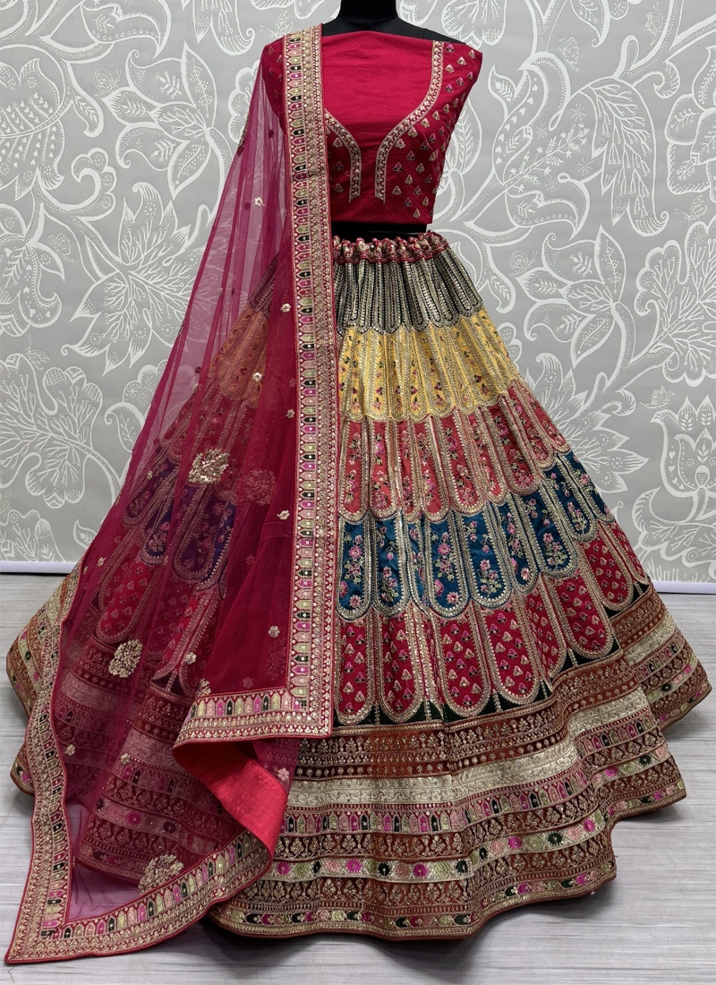 Soft net lehenga with colorful patches and thread embroidery in maroon