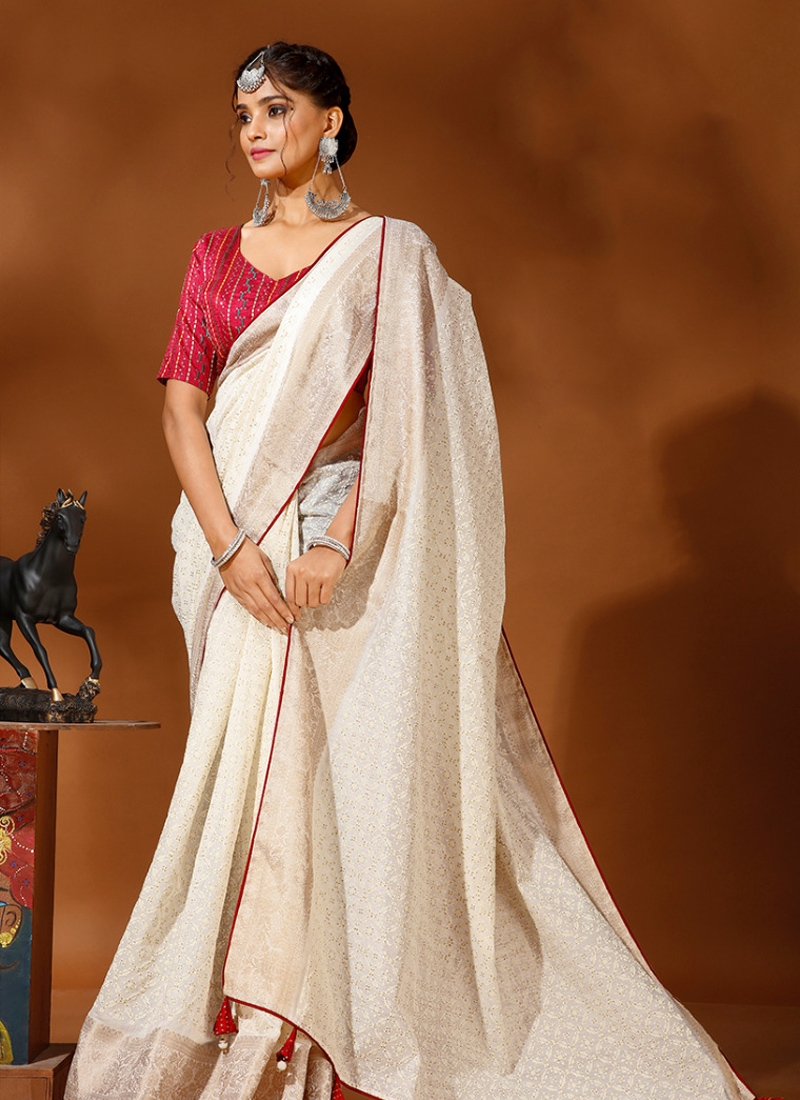 Traditional saree with jacquard border and thread embroidery in red