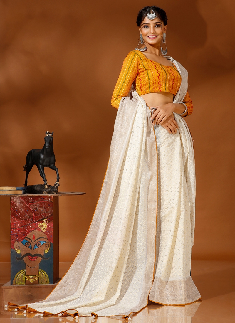 Traditional saree with jacquard border and thread embroidery in yellow