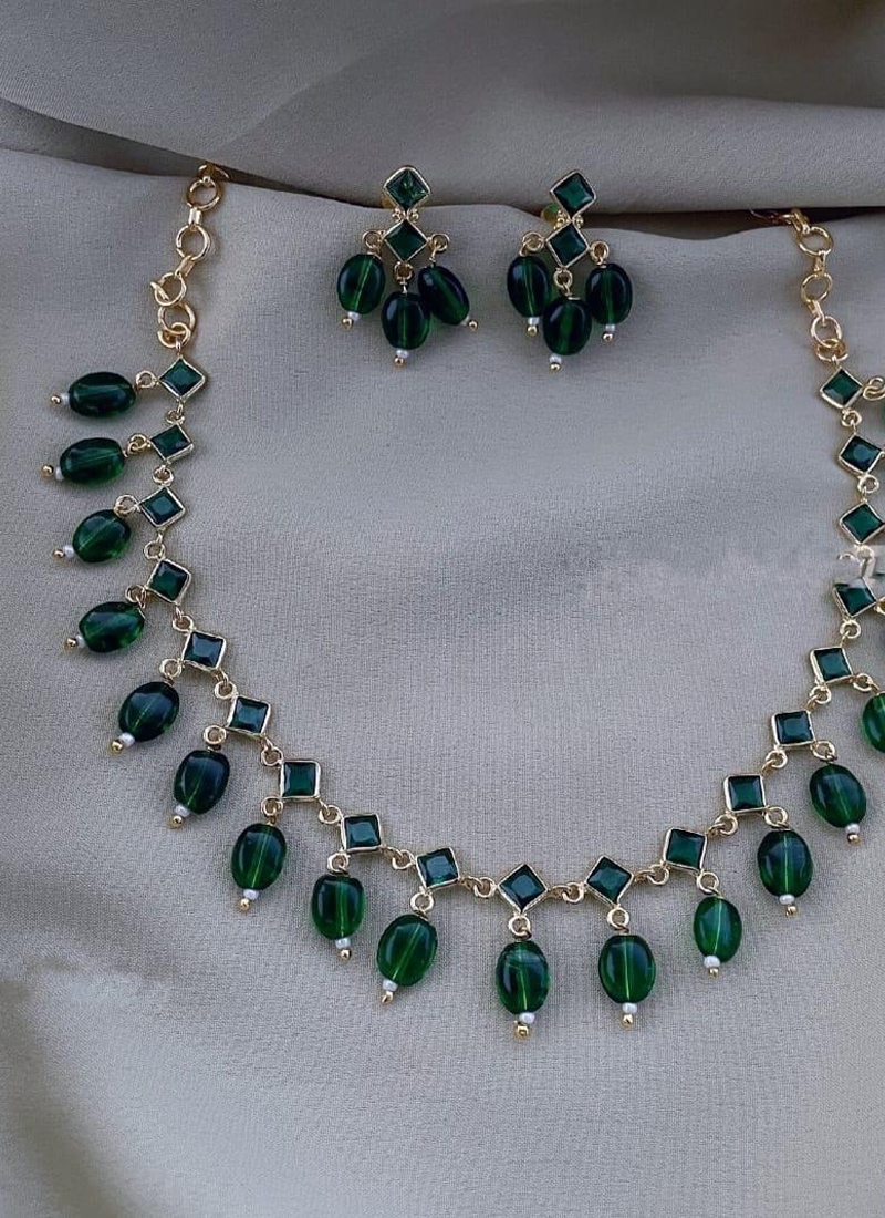 Designer gold plated necklace with green crystal