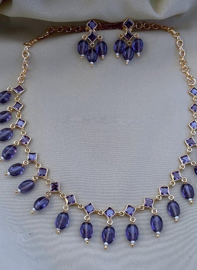 Designer gold plated necklace with blue crystal