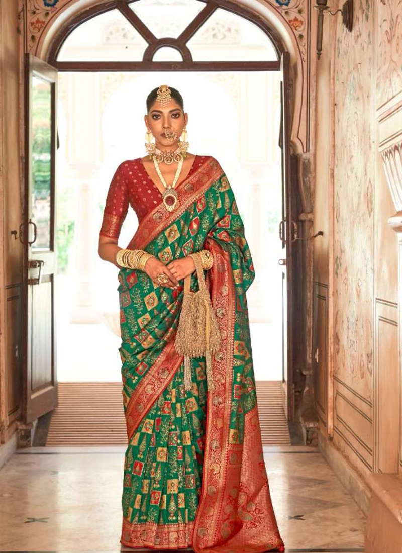 New exquisite banarasi silk saree with traditional design in dark green