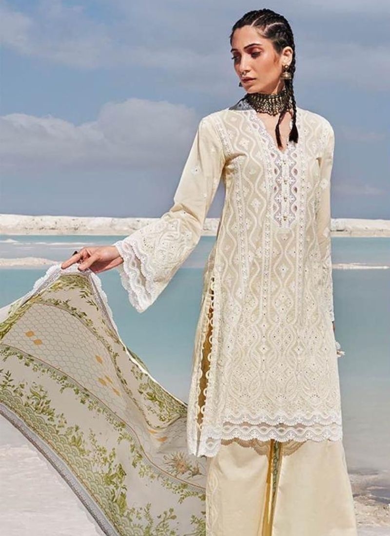 Exquisite cotton pant suit with mirror work in off white