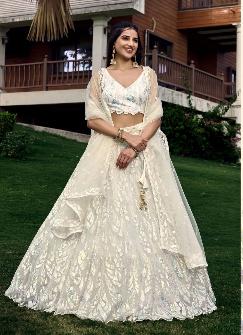 Heavy embroidered bridal lehenga in white