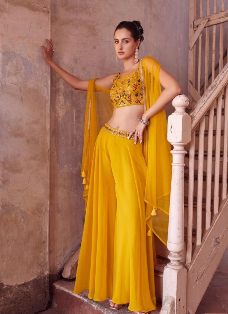 Designer georgette sharara and choli with hand embellishment in yellow