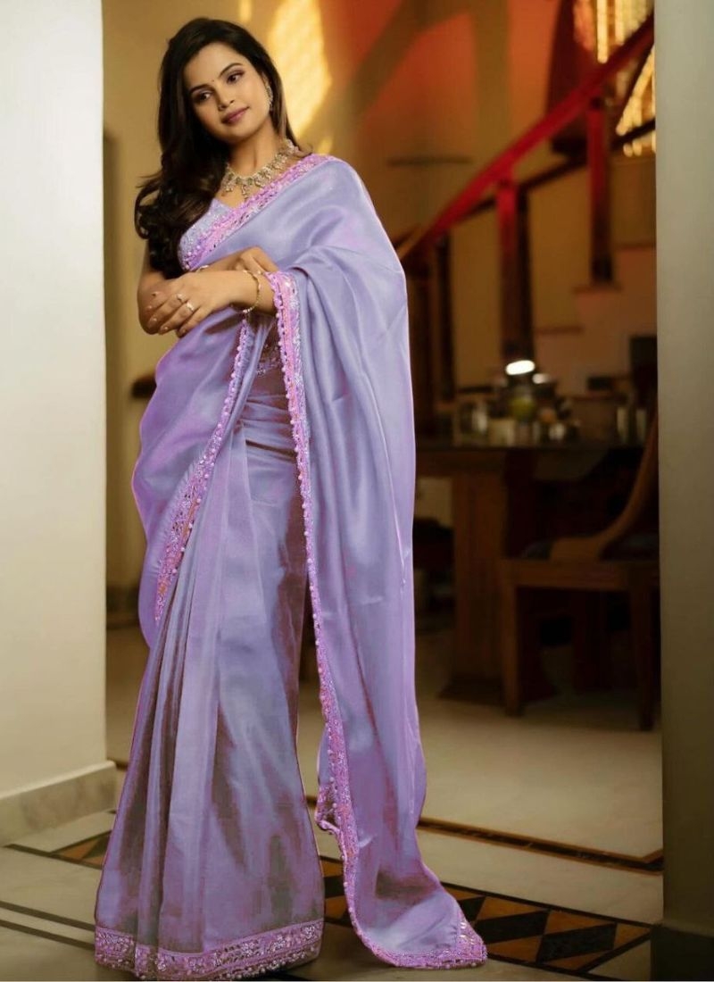 Trendy tissue silk saree with mirror work in light purple