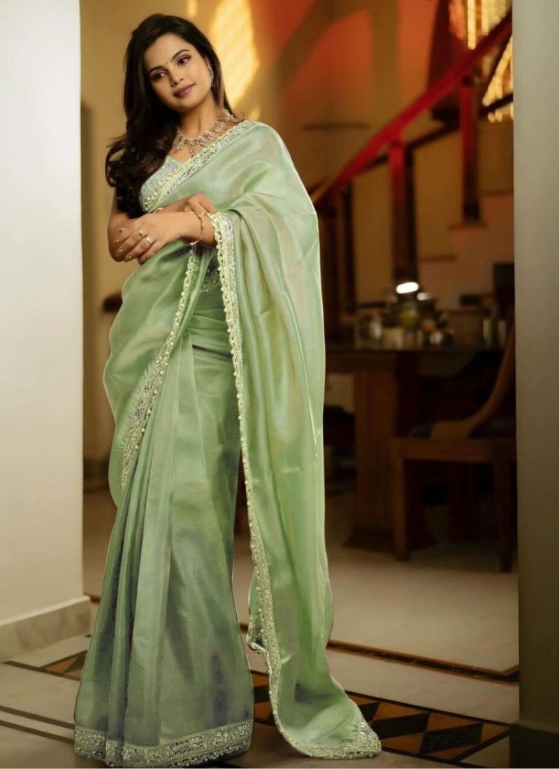 Trendy tissue silk saree with mirror work in light green