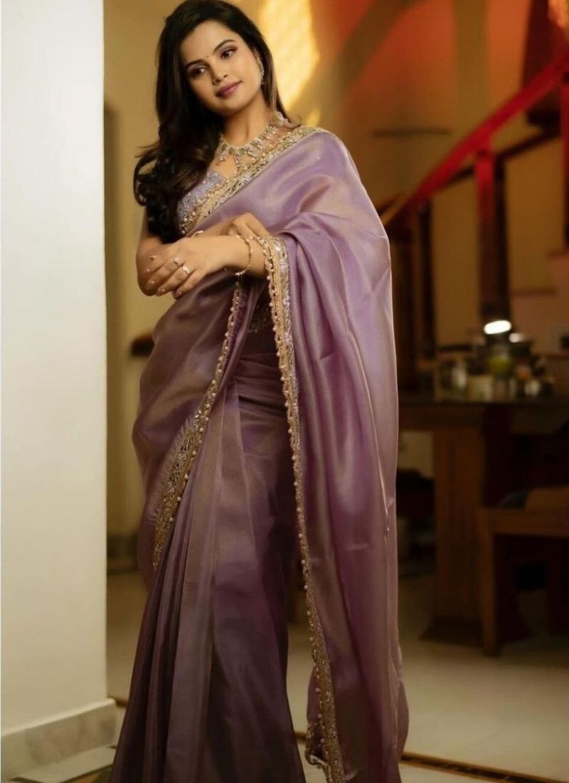 Trendy tissue silk saree with mirror work in dark purple