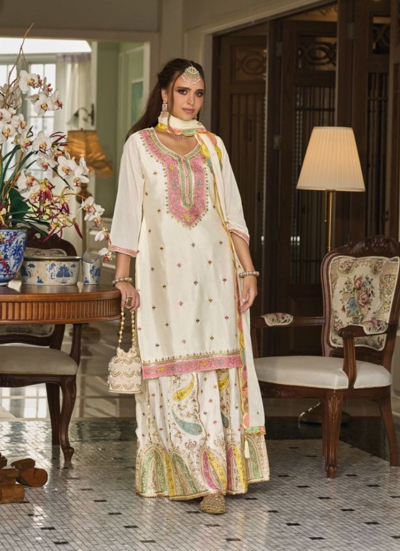 Beautiful palazzo suit with heavy floral embroidery in white